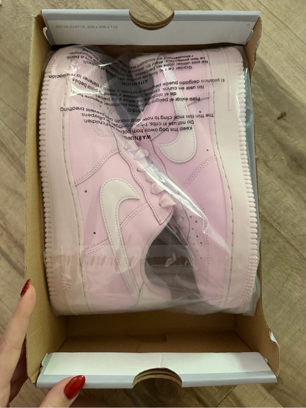 Nike Women's Pink and White Low-Top Sneakers